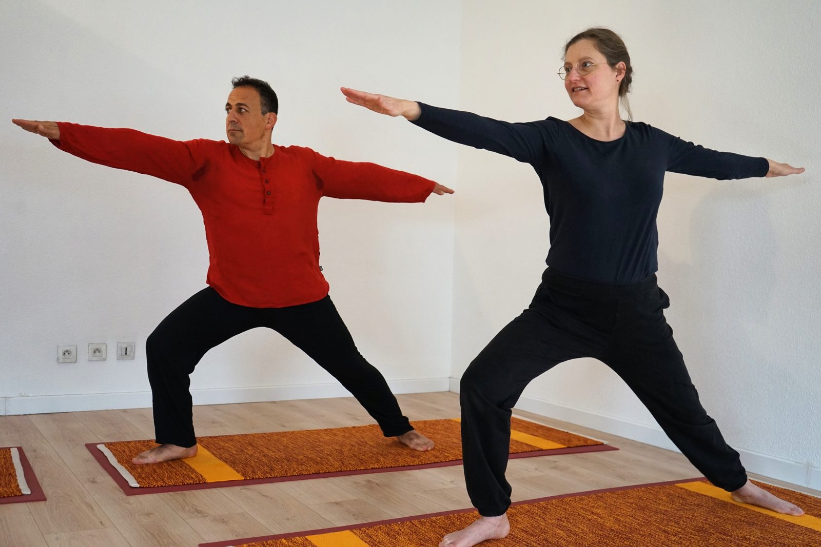 Cours de yoga - posture du guerrier